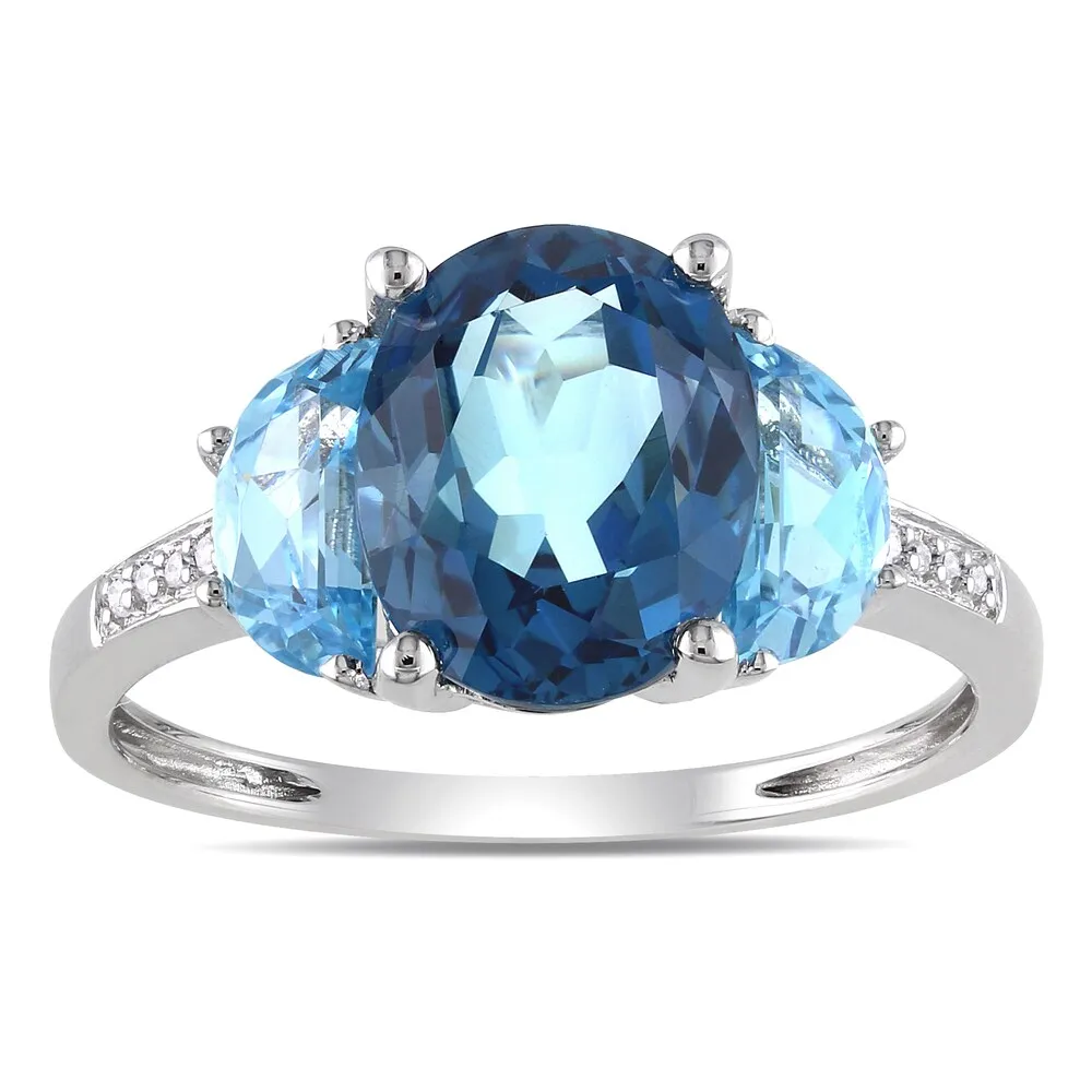 Miadora Sterling Silver 4 1/6ct TGW London Blue Topaz and Diamond Accent Cocktail Ring sold by Zulily