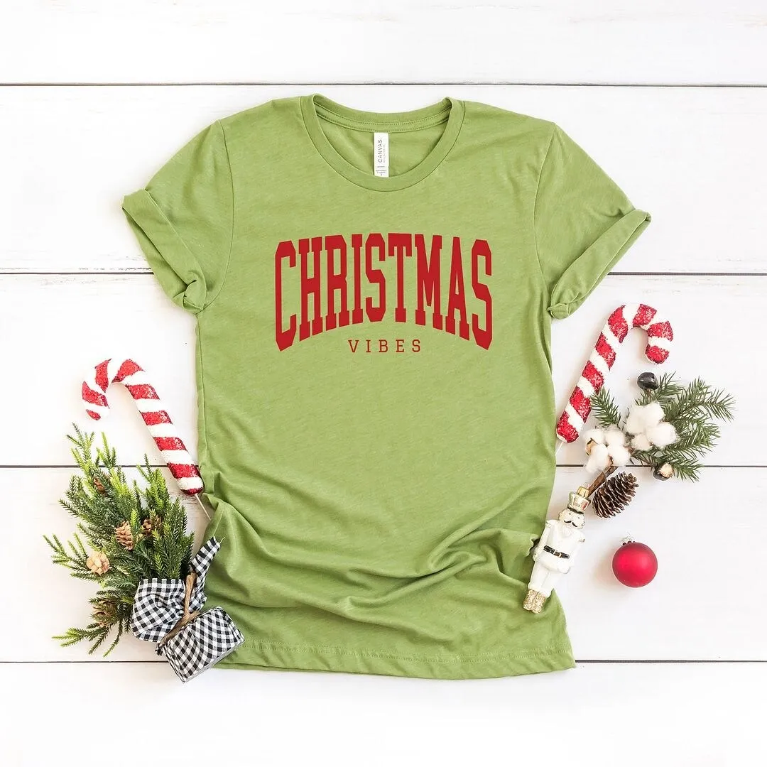 Christmas Vibes Varsity Short Sleeve Crewnneck Tee sold by Zulily