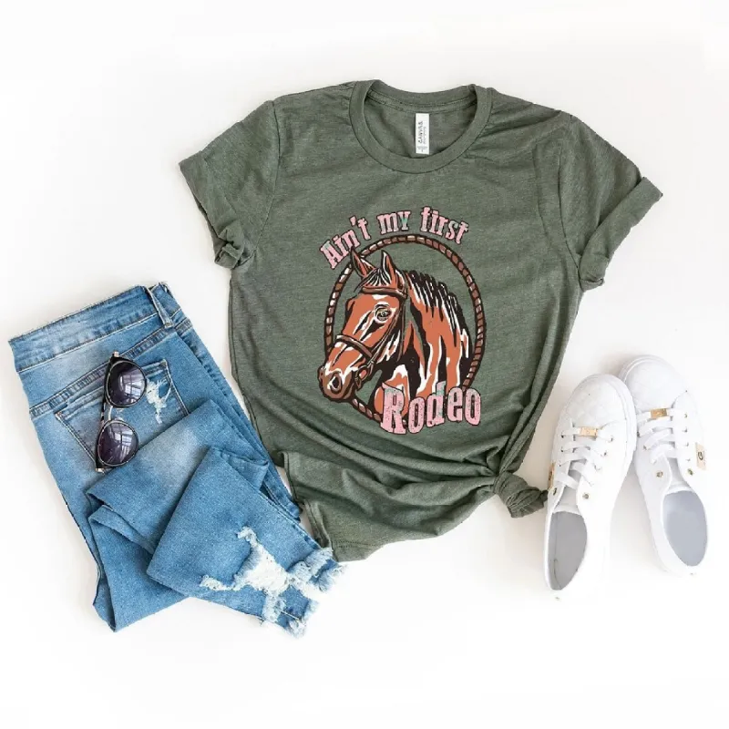Ain't My First Rodeo Horse Short Sleeve Crewnneck Tee sold by Zulily