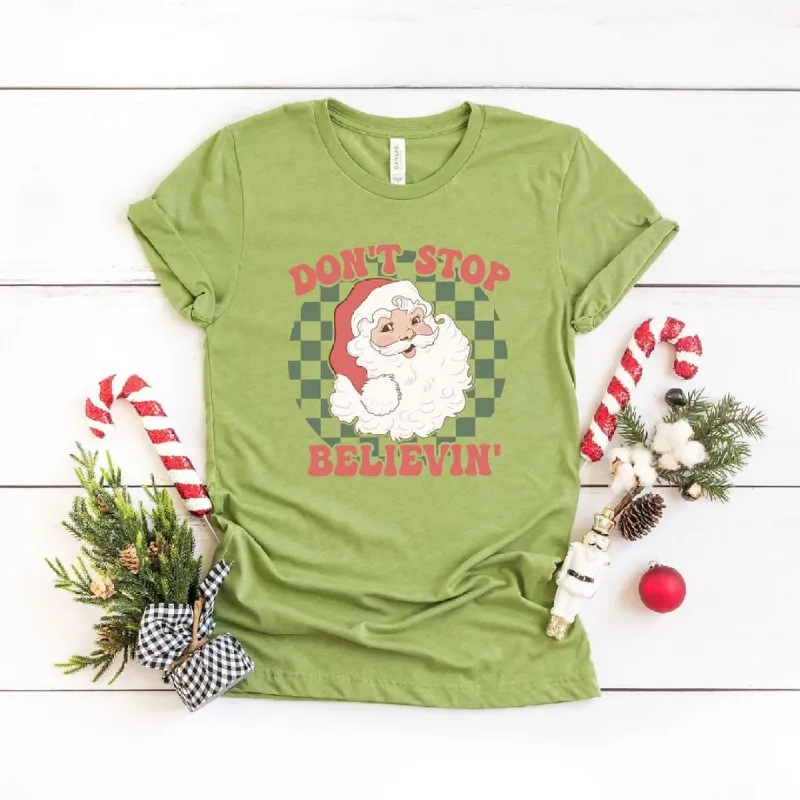Don't Stop Believin' Santa Checkered Short Sleeve Crewnneck Tee sold by Zulily