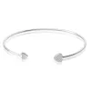RhythmRocks Sterling Silver Round Diamond Simulant CZ Double Heart Bangle Bracelet(AAA Quality) sold by Zulily