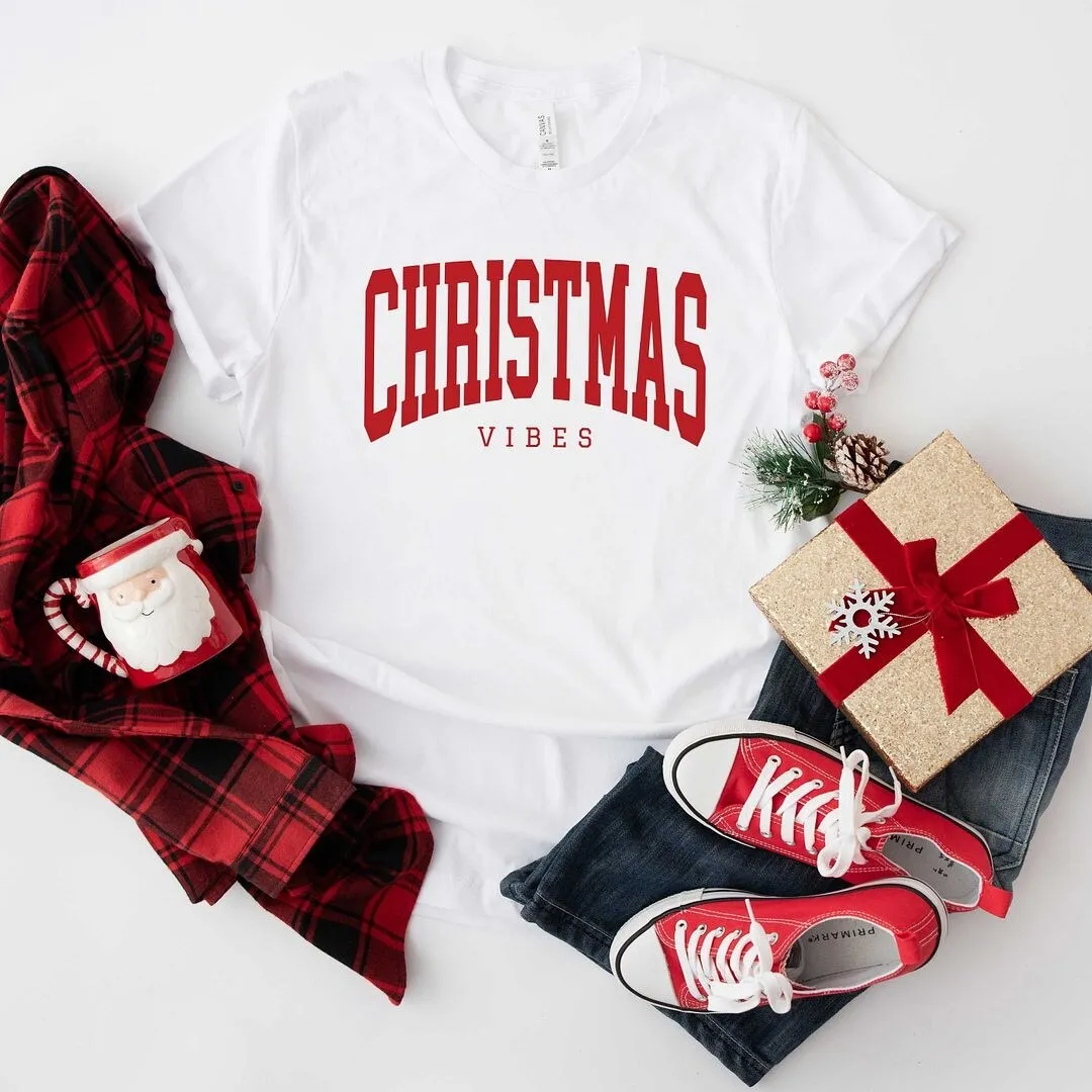 Christmas Vibes Varsity Short Sleeve Crewnneck Tee sold by Zulily