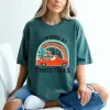 Powered By Christmas Garment Dyed Tee sold by Zulily
