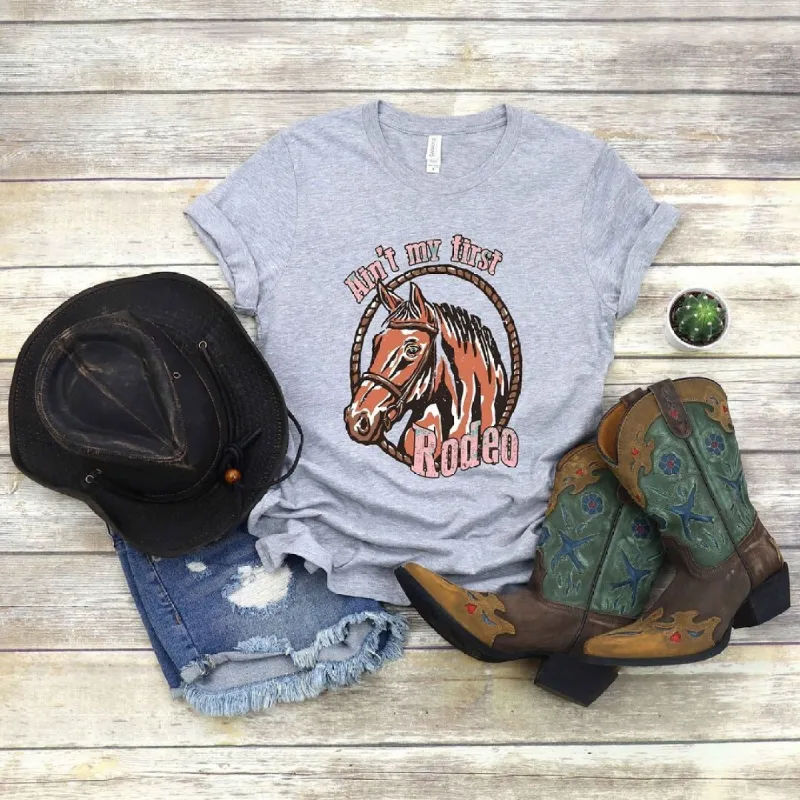 Ain't My First Rodeo Horse Short Sleeve Crewnneck Tee sold by Zulily