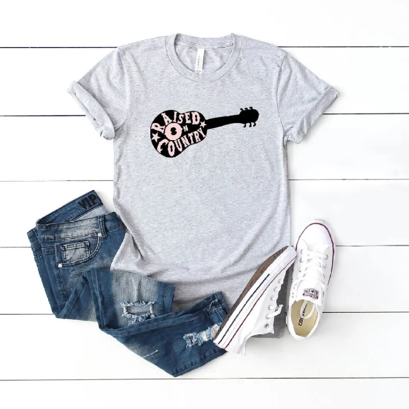 Raised On Country Guitar Short Sleeve Crewnneck Tee sold by Zulily