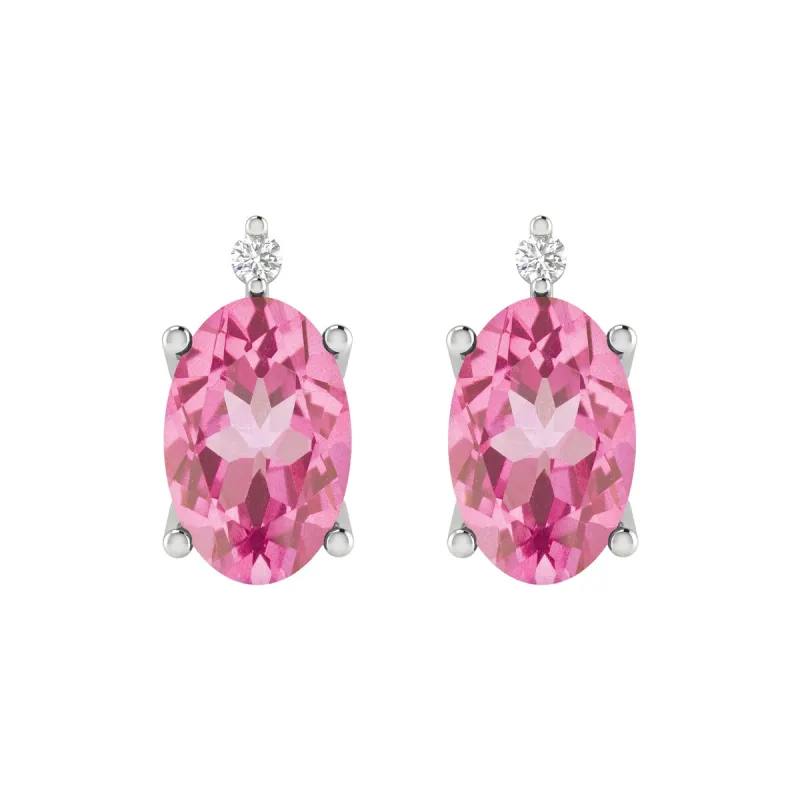 Sterling Silver Pink Topaz and White Diamond Stud Earrings sold by Zulily