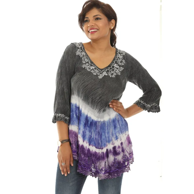 Three Quarter Sleeve Tunic with Floral Embellishment and Bold Color Pattern sold by Zulily