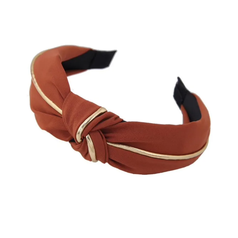 Orange Gold Knotted Headband sold by Zulily