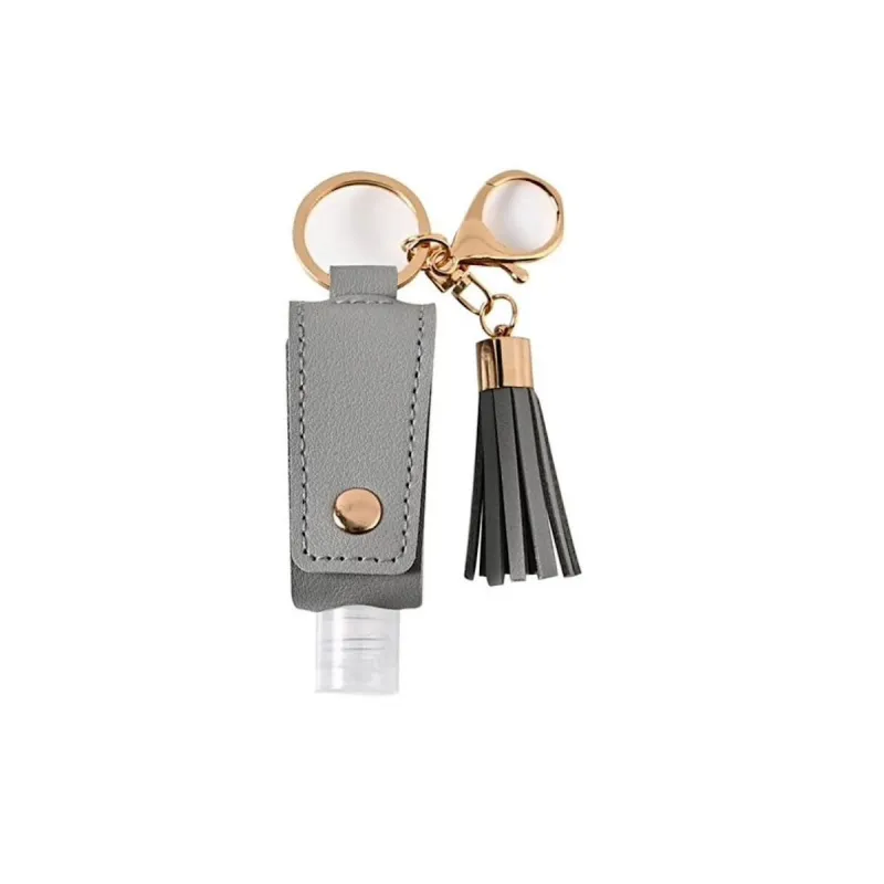 Grey Goldtone Tassel Hand Sanitizer Keychain With Empty Bottle sold by Zulily