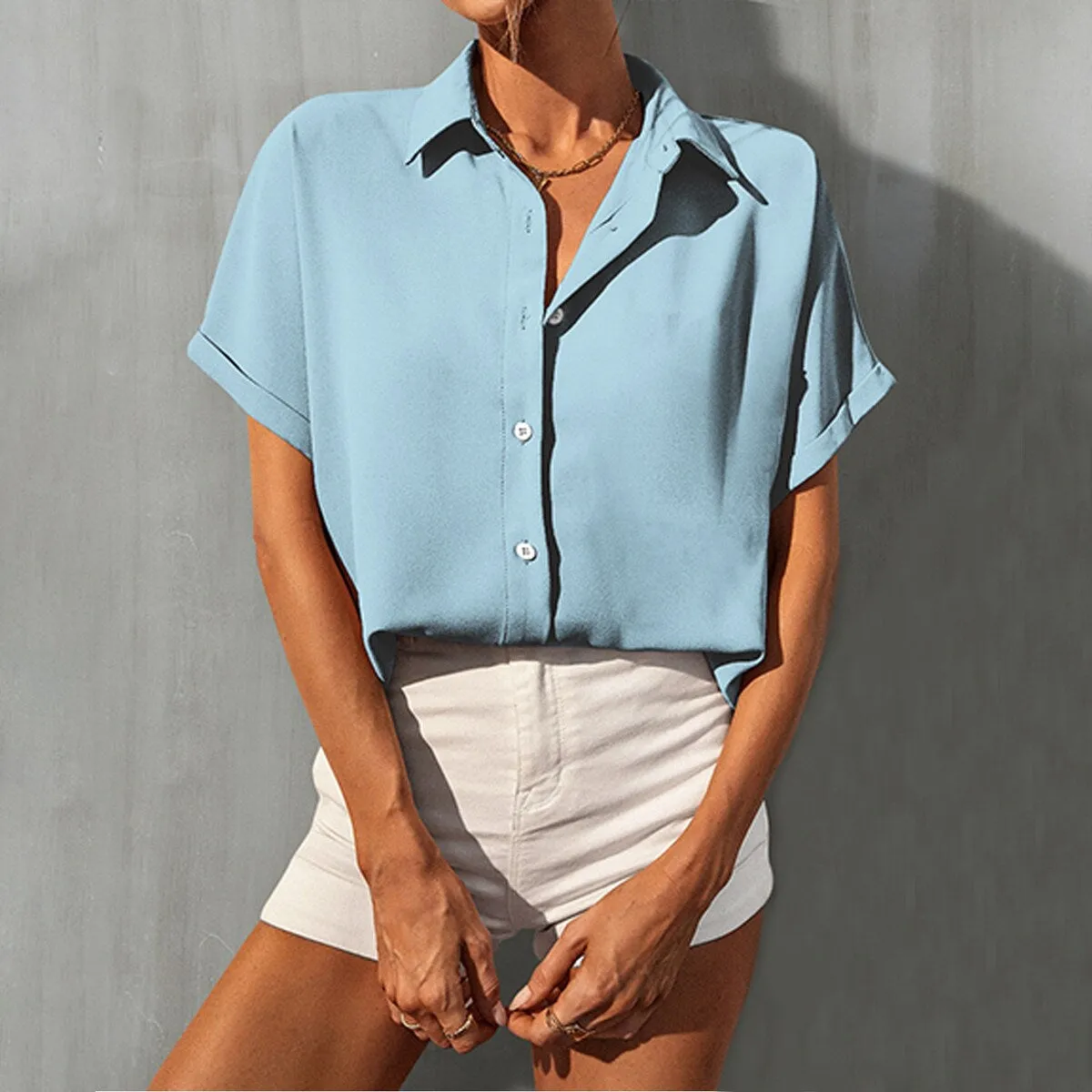 Light Blue Button Up Short Sleeve Shirt sold by Zulily