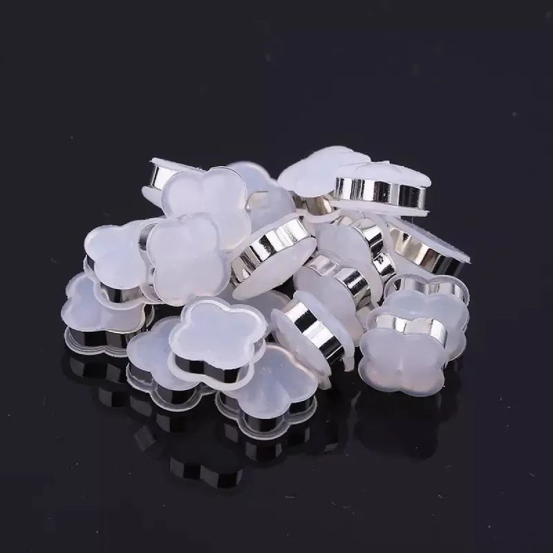 Silicone Clover earring Backings In Silver sold by Zulily