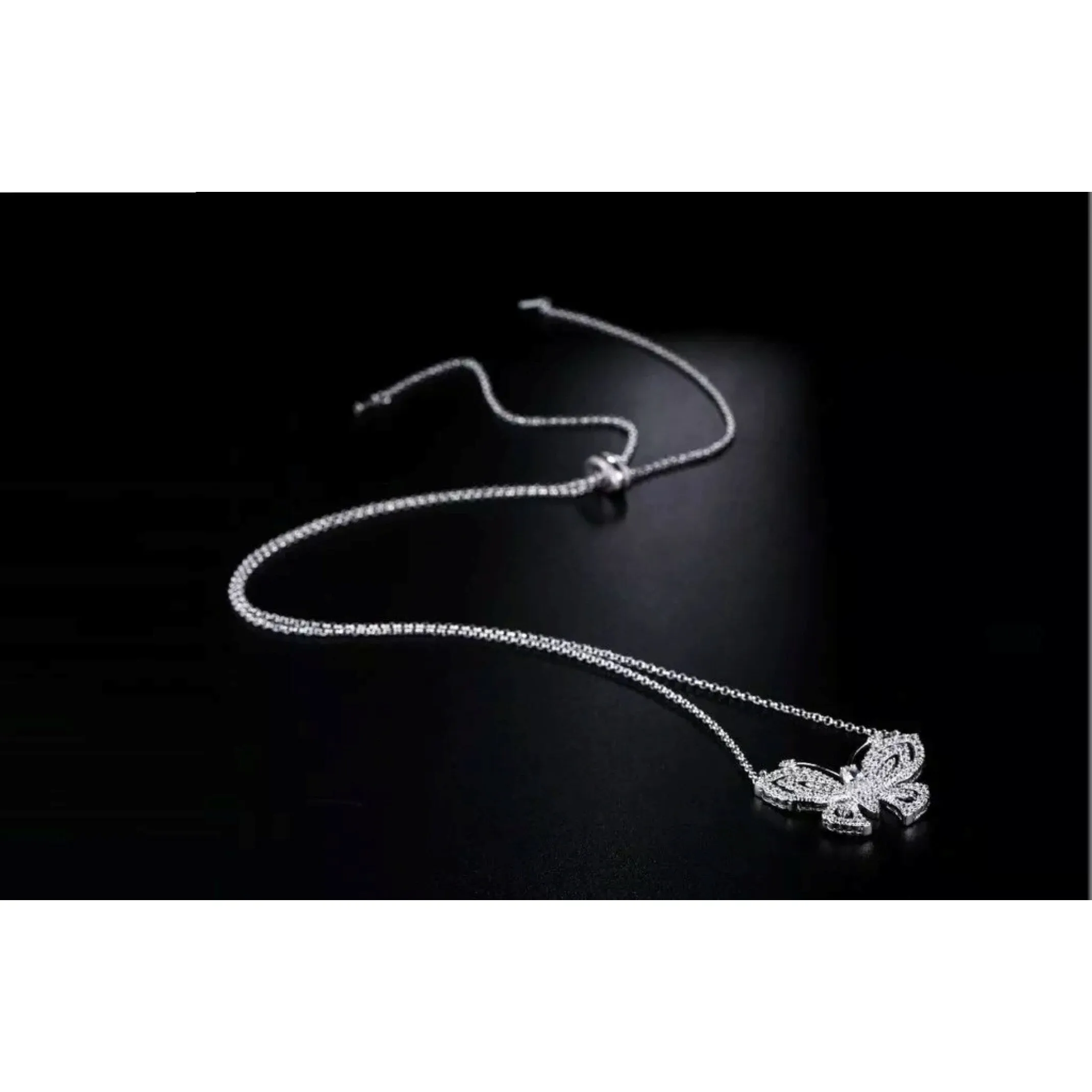 White Gold Plated Adjustable Crystal Butterfly Necklace - Silver sold by Zulily