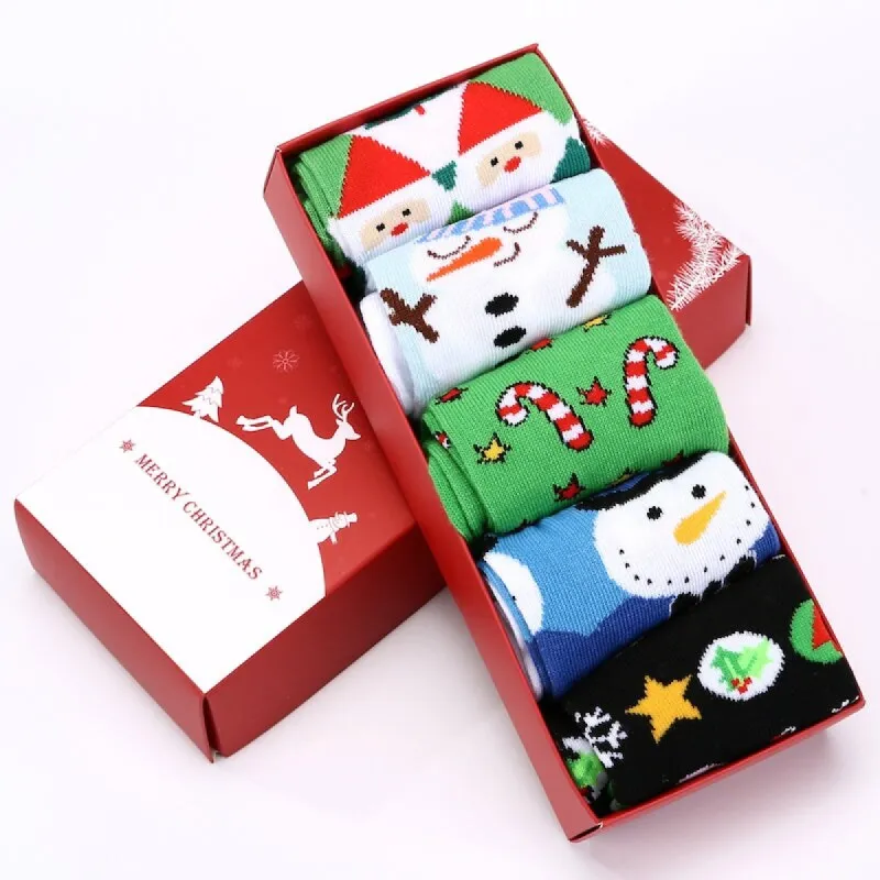 5 Pairs of Christmas Socks with Candycanes and Snowmen sold by Zulily