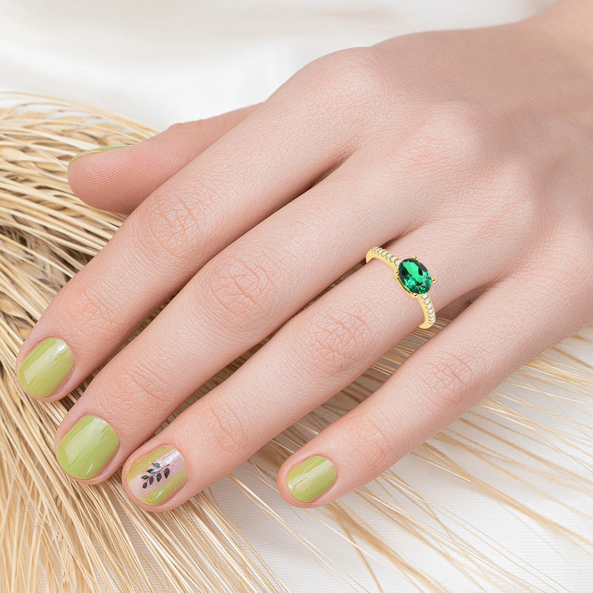 Sterling Silver 0.80cttw Emerald and White Topaz Solitaire Ring sold by Zulily