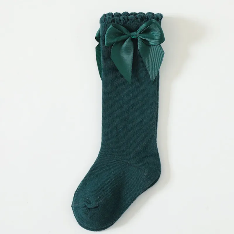 Green Bow Socks sold by Zulily