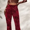 Red Velvet Flare Pants sold by Zulily