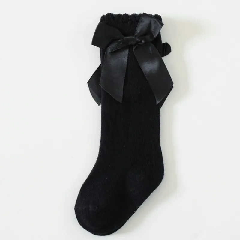 Black Bow Socks sold by Zulily