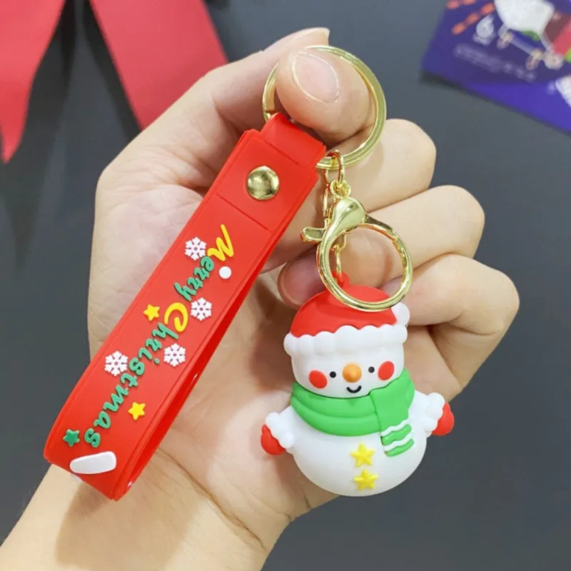 White & Green Scarf Snowman PVC Keyrings sold by Zulily