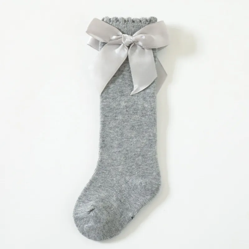 Grey Bow Socks sold by Zulily
