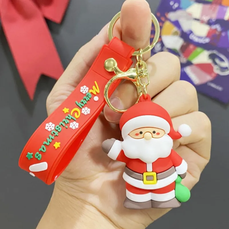 Red Santa Claus PVC Keyrings sold by Zulily