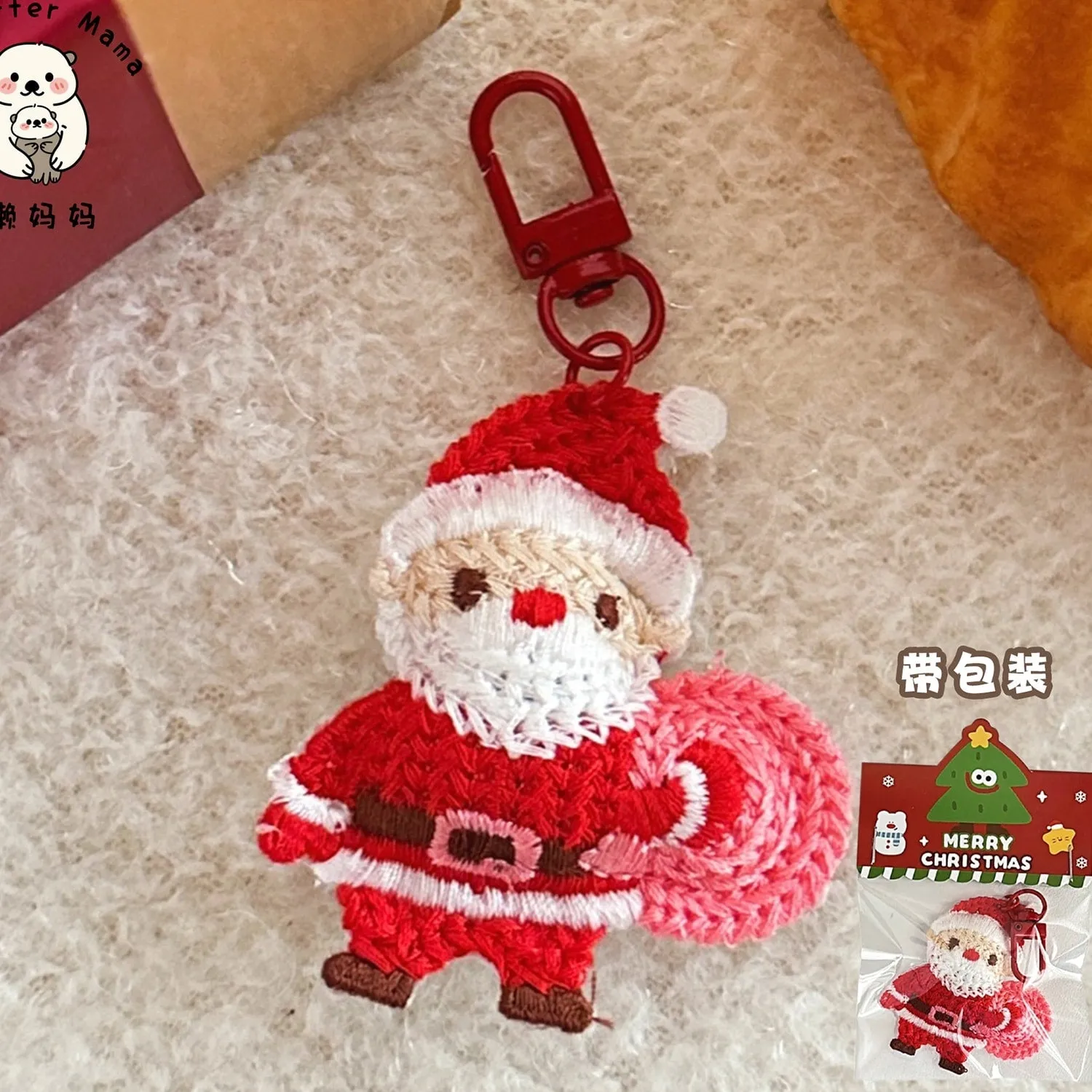 Red Santa Claus Crocheted Keyrings sold by Zulily