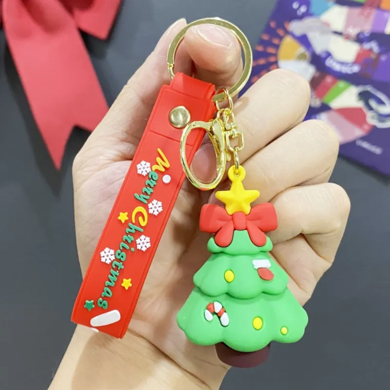 Green Bow Christmas Tree PVC Keyrings sold by Zulily