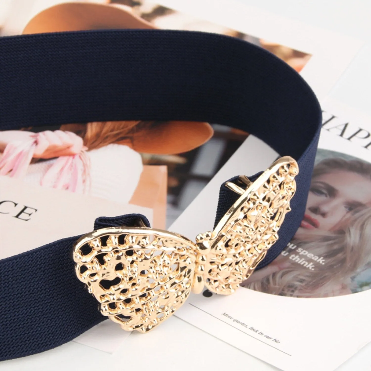 Navy Butterfly Alloy Buckle Elastic Belt sold by Zulily