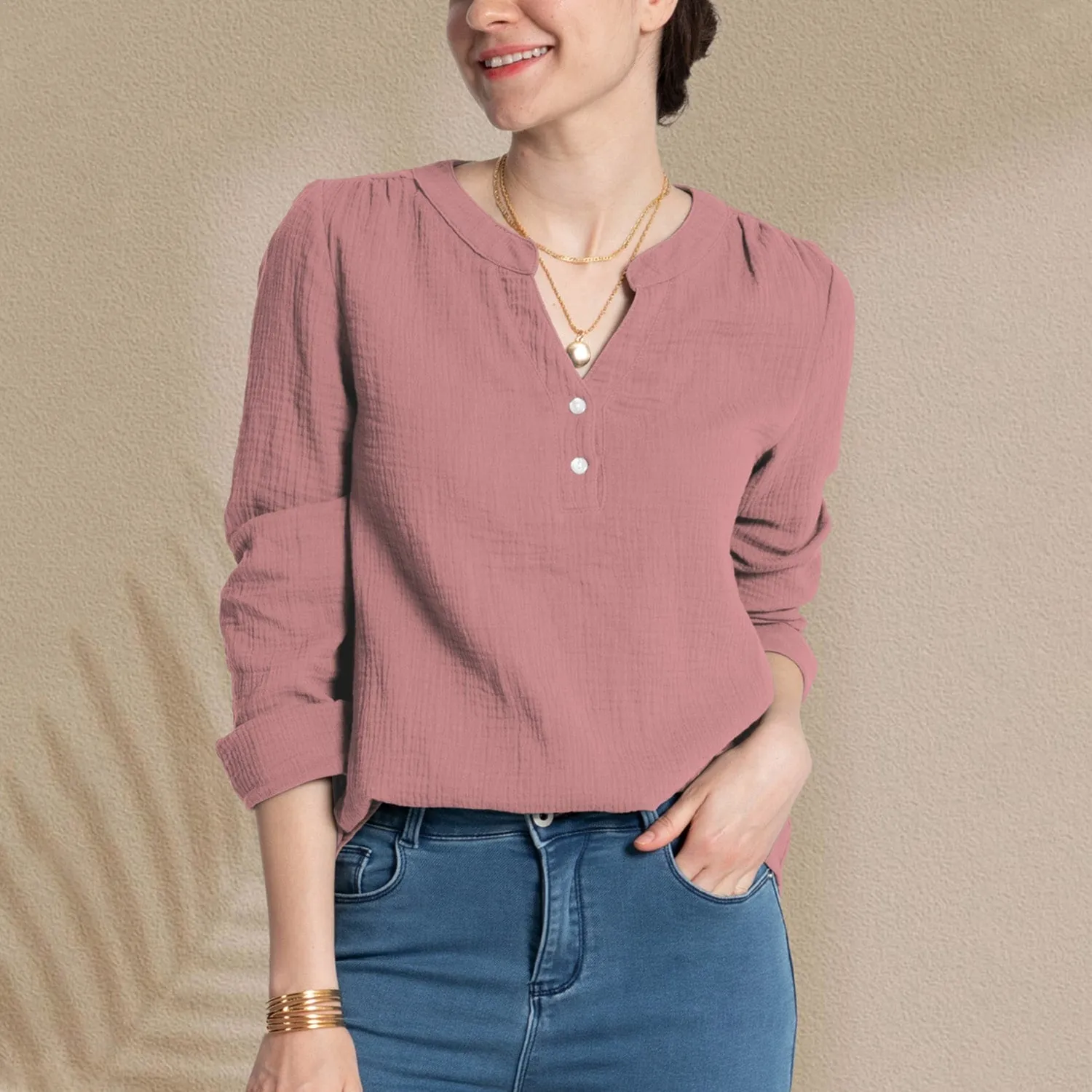 Pink Crinkle Notched Long Sleeve Blouse sold by Zulily