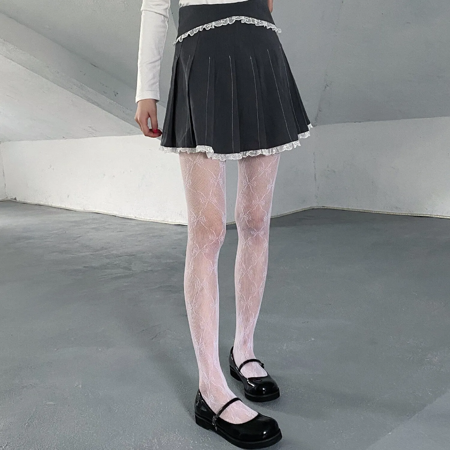 White Bow Mesh Pantyhose sold by Zulily