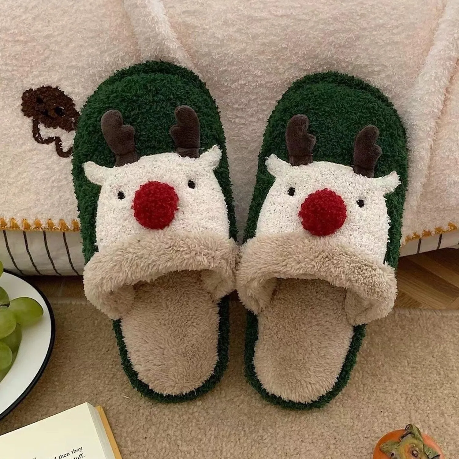Green Christmas Reindeer Slippers sold by Zulily