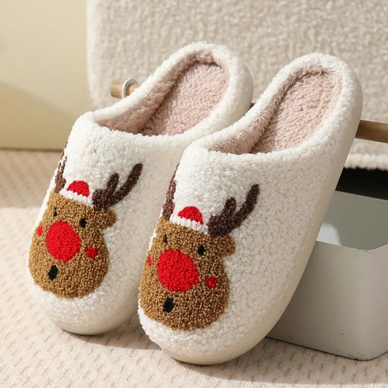 White & Red Christmas Reindeer Slippers sold by Zulily