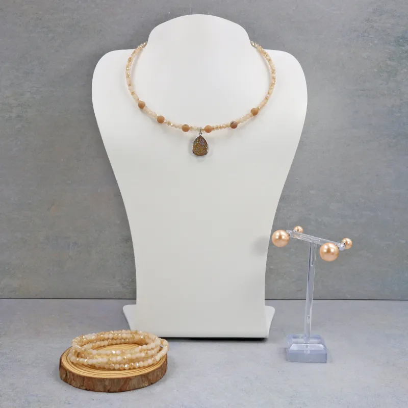 Golden Glow: Peach Mother of Pearl and Crystal glass Necklace, Bracelet, and Earrings Set sold by Zulily