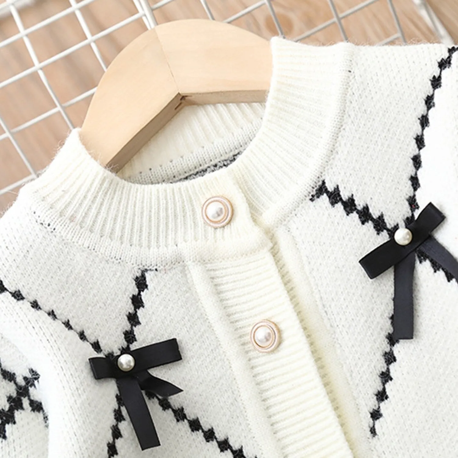 White & Black Bow Knitted Cardigan Suit sold by Zulily product image thumbnail 3