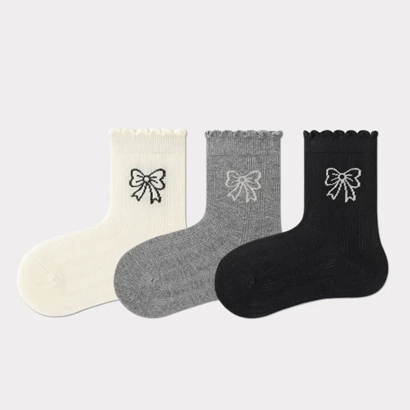 White Grey & Black Three-piece Bow Socks Set sold by Zulily
