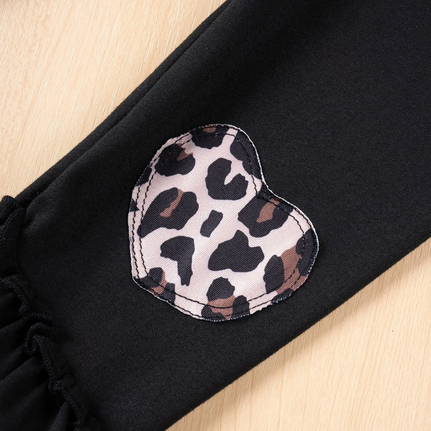 Brown Leopard Ruffle-Accent Top & Black Leopard Heart Ruffle Flare Pants sold by Zulily product image thumbnail 5