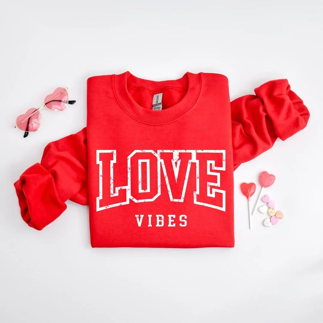 Love Vibes Varsity Graphic Sweatshirt sold by Zulily