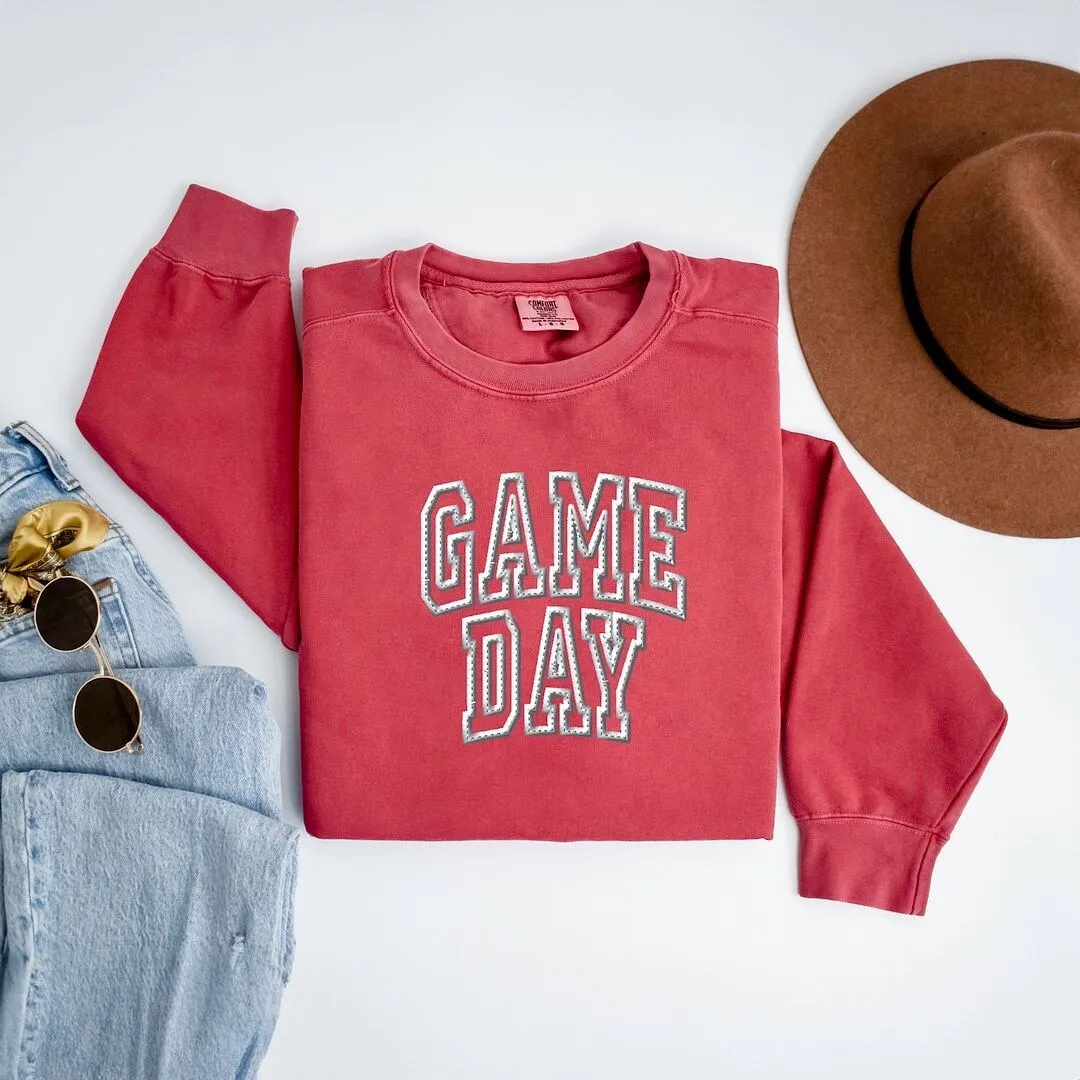 Embroidered Game Day Arched Garment Dyed Sweatshirt sold by Zulily