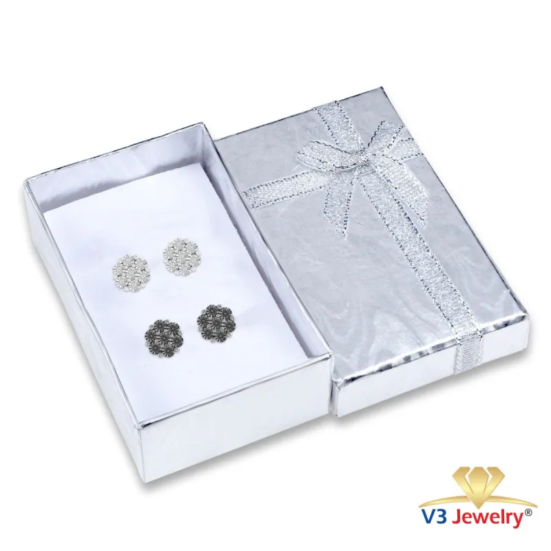 Set of Two Sterling Silver Natural White Diamond and Yellow Diamond Flower Earrings sold by Zulily