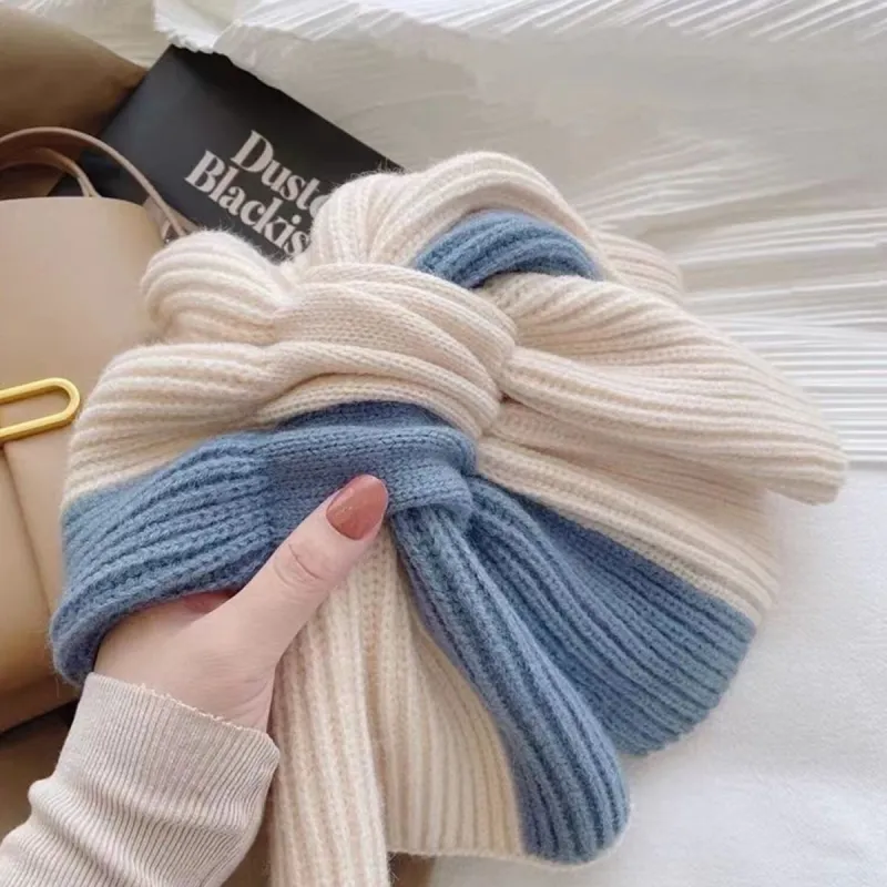 Beige & Blue Color Block Knitted Cross Scarf sold by Zulily