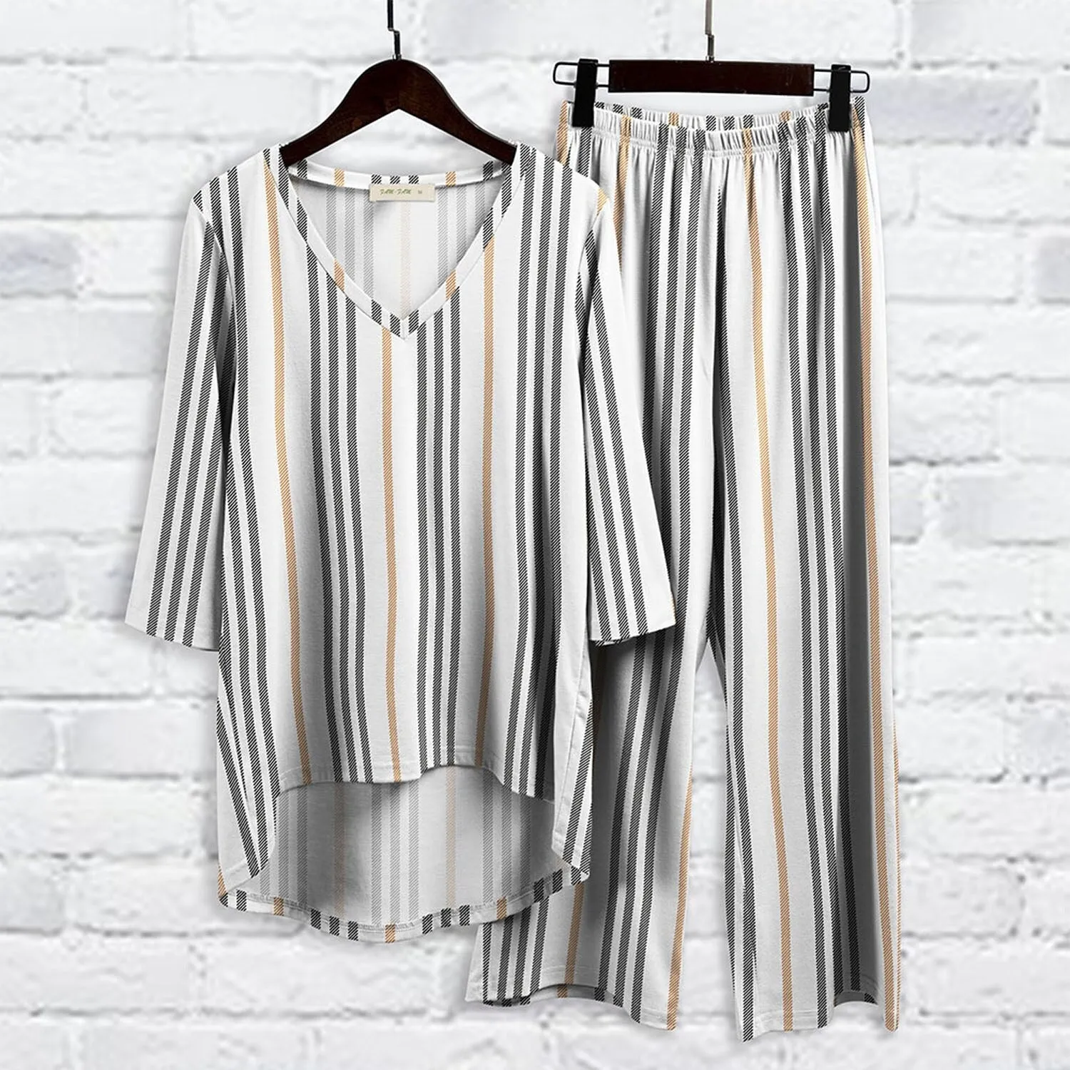 White & Black Stripe Print Three-Quarter Sleeve Hi-Low Tunic & Wide-Leg Pants sold by Zulily product image thumbnail 2