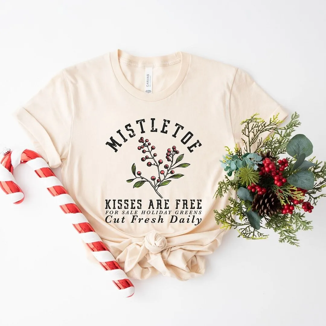 Mistletoe Kisses Are Free Short Sleeve Crewnneck Tee sold by Zulily