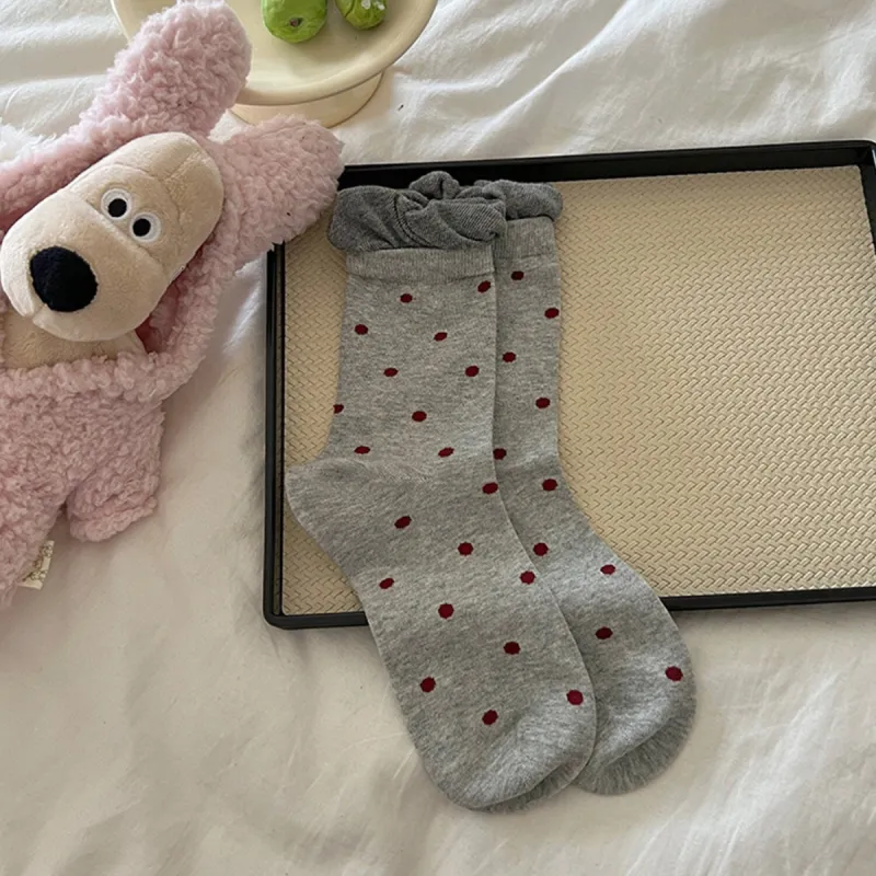 Grey Polka Dot Socks sold by Zulily