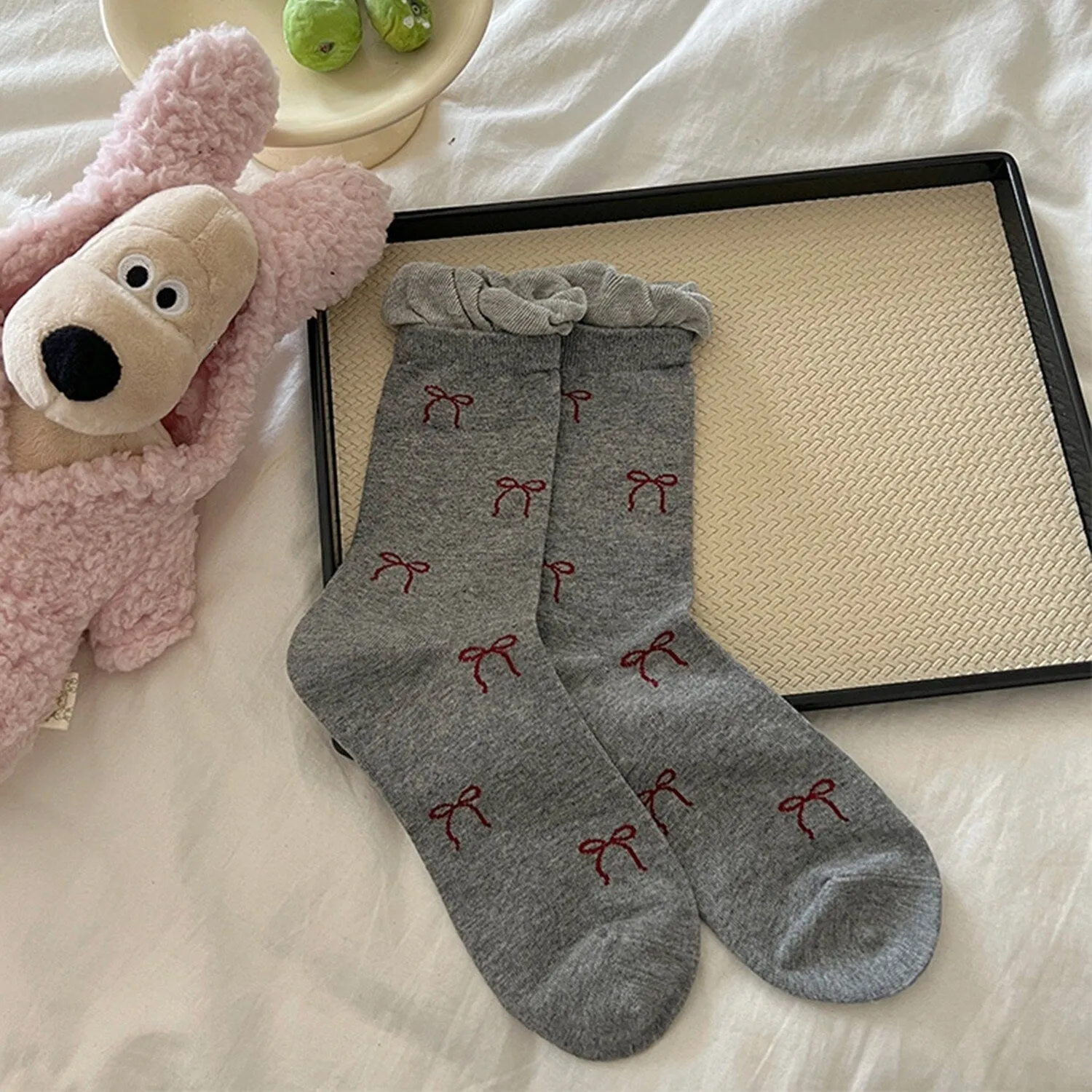 Grey Bow Socks sold by Zulily