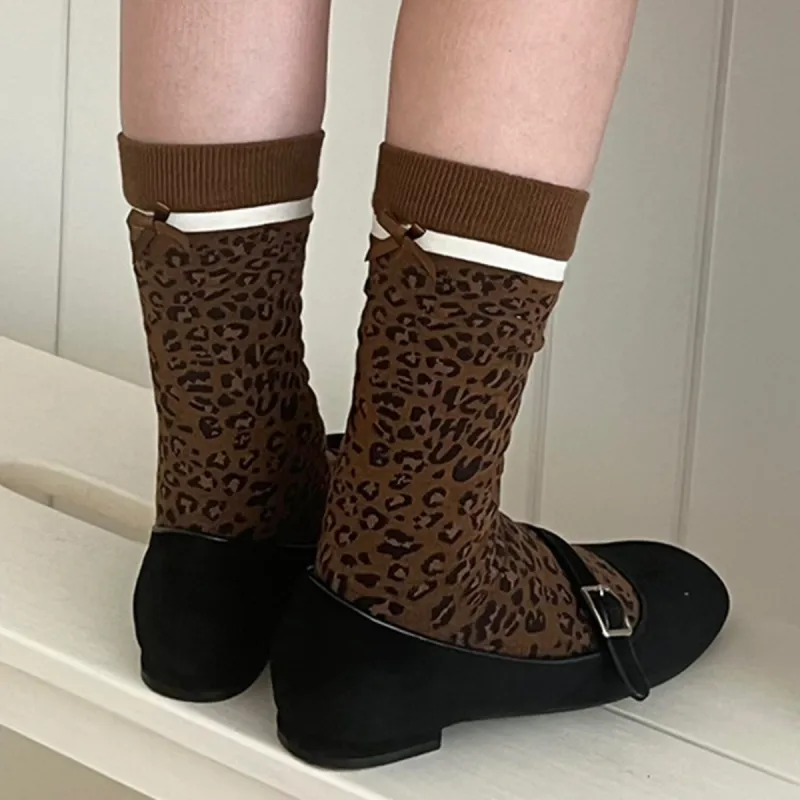 Brown Leopard Bow Socks sold by Zulily