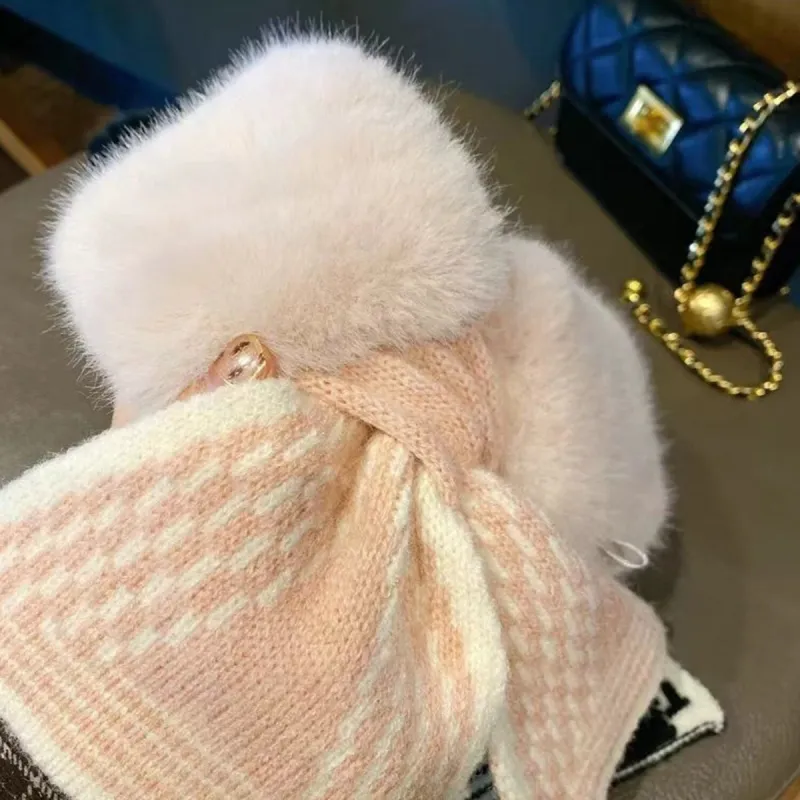 Pink Plush Cross Geometric Scarf sold by Zulily