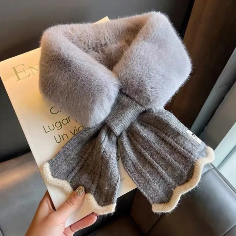Grey Plush Cross Scarf sold by Zulily
