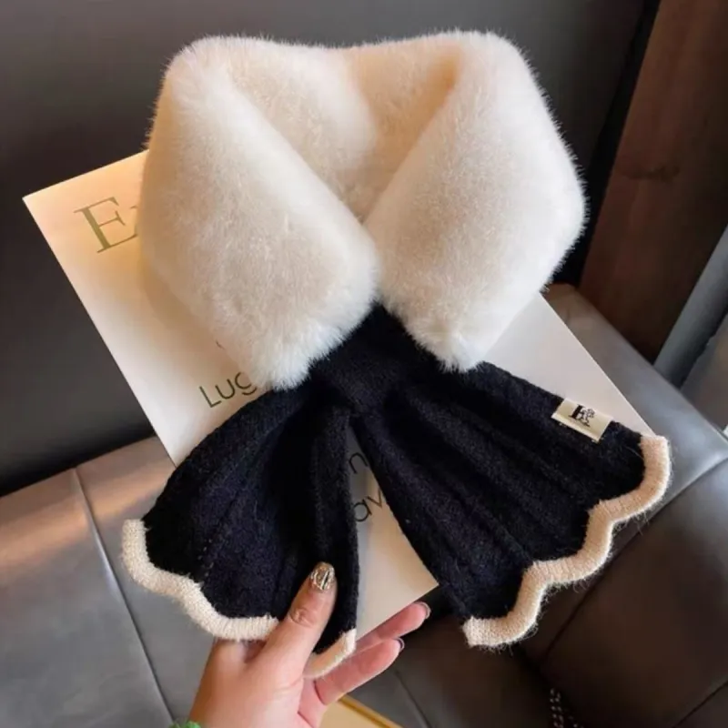Black Plush Cross Scarf sold by Zulily