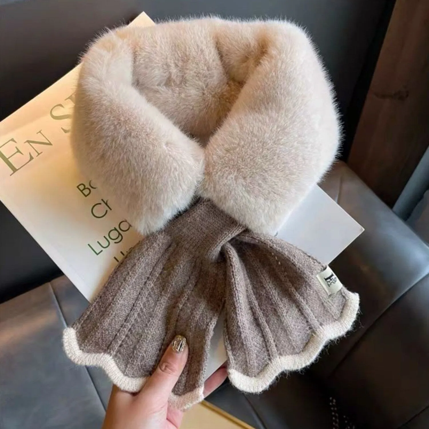 Beige Plush Cross Scarf sold by Zulily