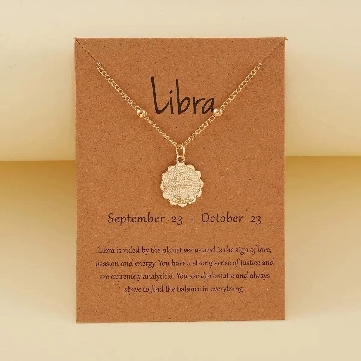 Goldtone Star Sign Zodiac Circular Pendant Necklace sold by Zulily product image thumbnail 2