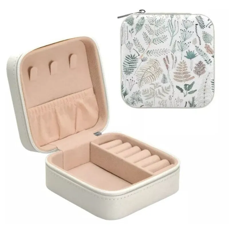 Compact Travel Size Jewelry Storage Box With Fern And Leaf Pattern sold by Zulily